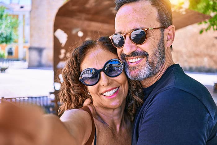 Woman and Man Wearing Sunglasses